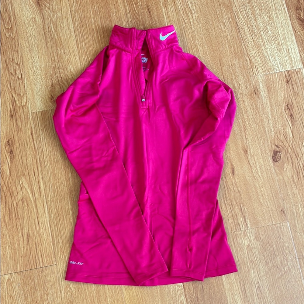 Nike pink half zip in size small